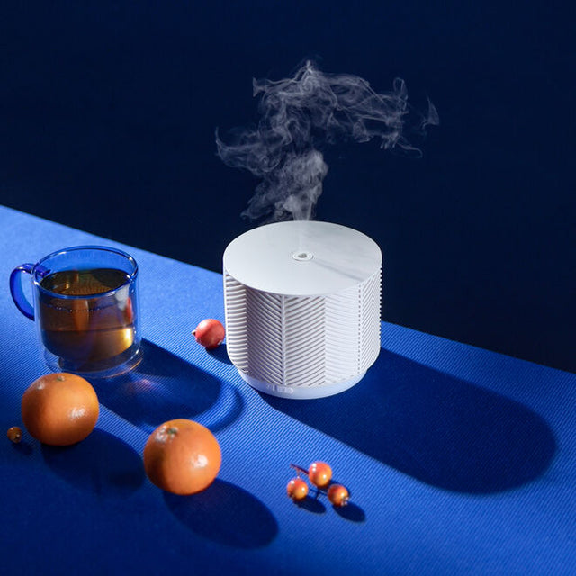 Vanilla aroma nook diffuser on dark blue background
