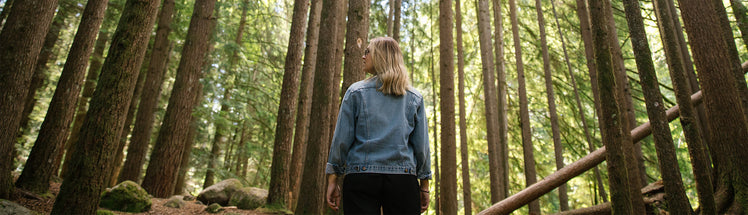 A person standing in the woods