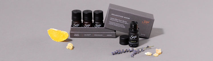 Saje Relaxation Room Diffuser Blend Collection displayed with citrus and lavender