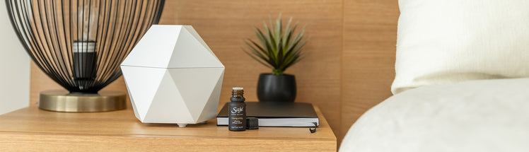 Aroma Be Free diffuser placed on bedside table 
