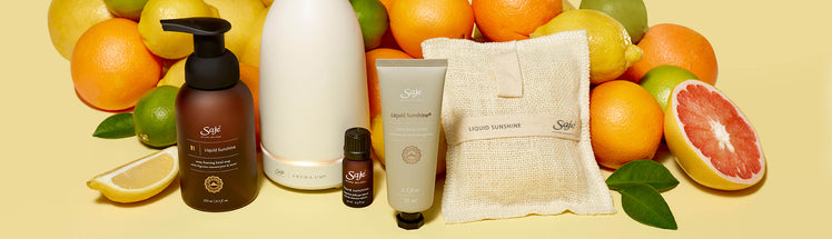Liquid sunshine collection placed with grapefruit, orange, lime and lemons