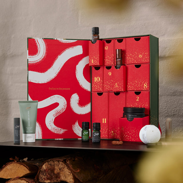 Joy to the season advent calendar opened with product on black shelf