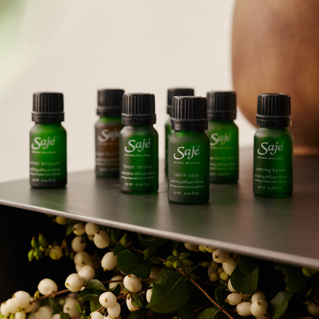 Holiday Diffuser Blends sitting on a table 