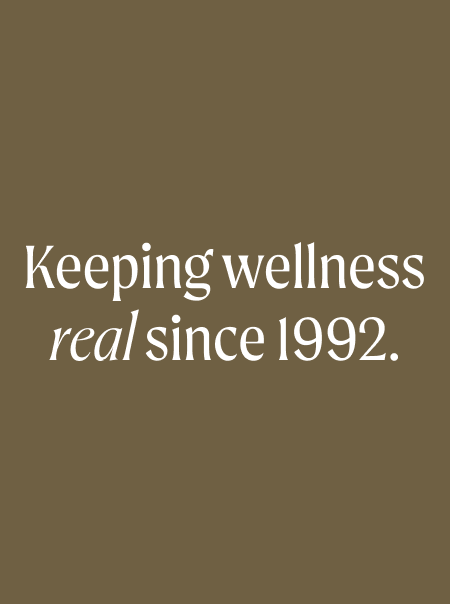 keeping wellness real since 1992 on a brown background.