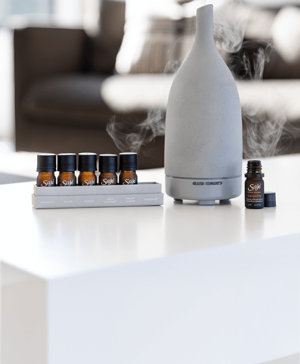 A selection of Saje diffuser blend kits lined up.
