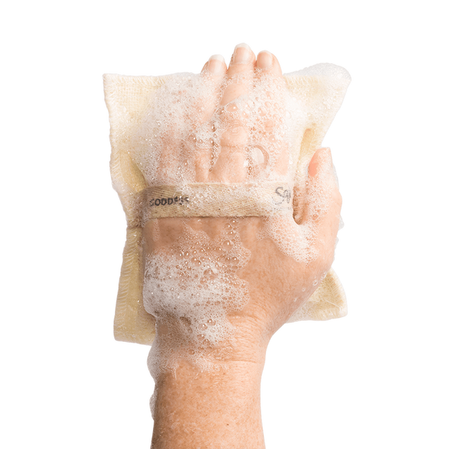 Goddess Jute & Joy Wash Pad with lather on a wet hand