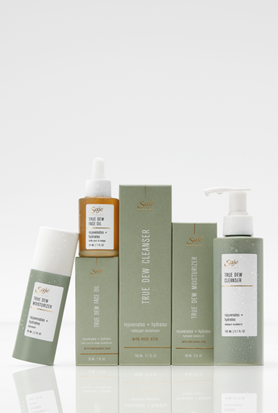 A Saje True Dew skincare collection featuring a cleanser, moisturizer and face oil.