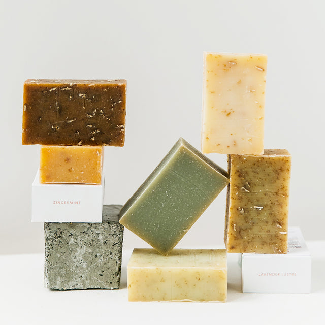 A collection of Saje Natural Wellness soap bars